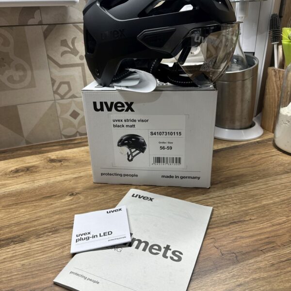Kerékpáros sisak Uvex Stride Visor 56-59cm bukósisak Új fekete